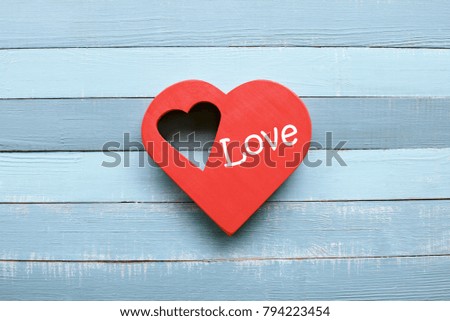 love symbol against the background of a wall