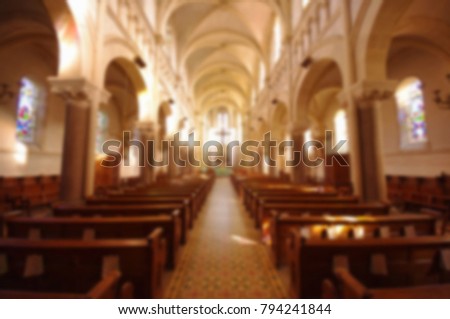 interior of a small catholic church. Abstract blur