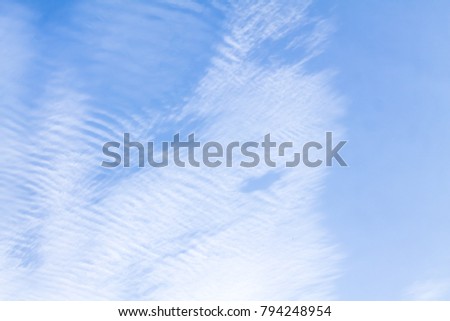 Beautiful clouds against blue sky as background wallpaper