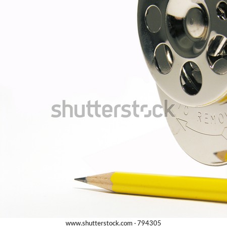 A photo of a pencil sharpener and pencil with a sharpen theme