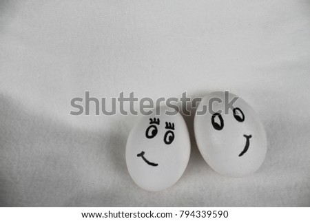 valentines day eggs on the right side in front of a withe background 