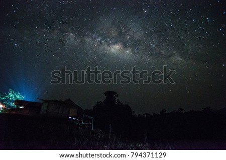 Milkyway with indigenous people house, long exposure photo with some noise