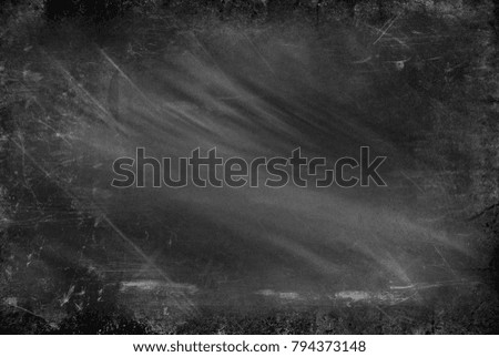 Black and white background abstract background. Scratched, vintage effect. The dark tonality. Grunge monochrome.