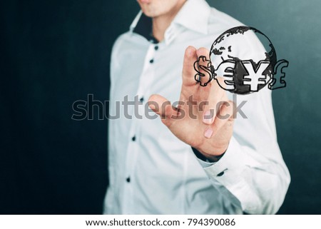 Currency symbols on businessman hand