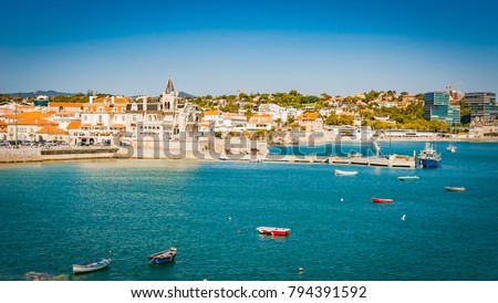 Portugal, Cascais near Lisbon, seaside town with beach and port panorama view Royalty-Free Stock Photo #794391592