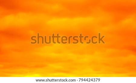 a fantastic yellow red sky. apocalyptic sky. background. Royalty-Free Stock Photo #794424379