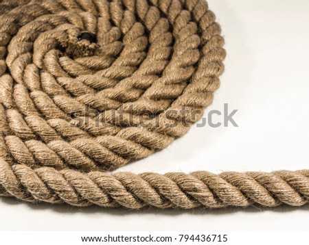 a natural jute rope isolated on white background Royalty-Free Stock Photo #794436715