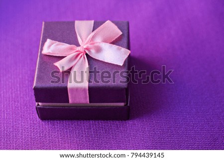little gift box on purple 