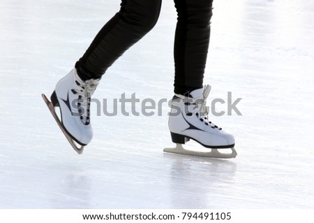 foot ice-skating people on the ice rink