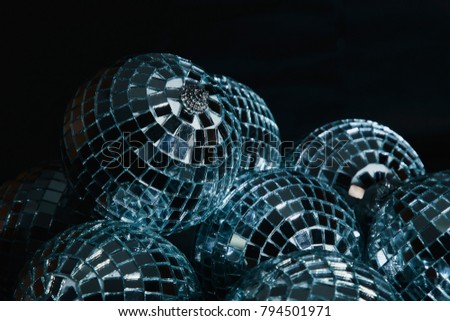 Group of Disco Balls in black background. Mirror balls.