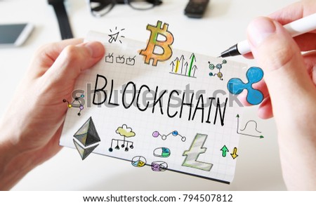 Blockchain with mans hands and a white notebook