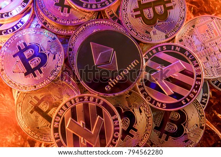 Ethereum on a pile of cryptocurrency Royalty-Free Stock Photo #794562280