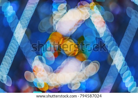 Abstract outline of light- colored circles bokeh. Blurred background