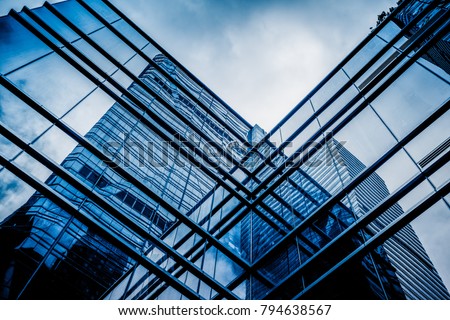 glass architecture of modern building in tokyo Royalty-Free Stock Photo #794638567