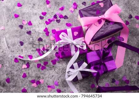 Valentines day background. Gift box and greeting card. Love symbol.