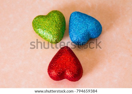 greeting card with bright colorful hearts on background