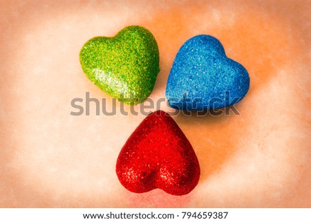 greeting card with bright colorful hearts on background