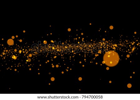 Gold glitter powder splash background. Golden dust. Magic mist glowing.Abstract circular bokeh background