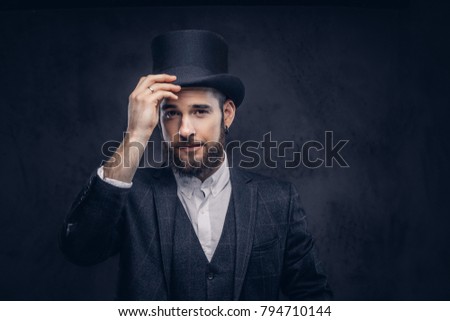 Portrait of a stylish bearded male.