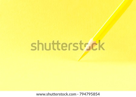 pencil bright stands on paper background image