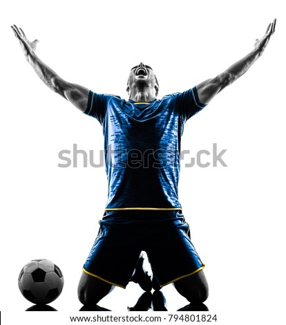 one caucasian soccer player man happy celebration  in silhouette isolated on white background