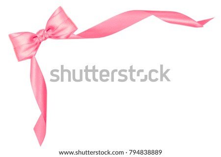 Frame from pink shiny satin bow and ribbons isolated on white background