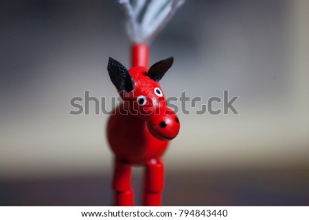 wooden red horse