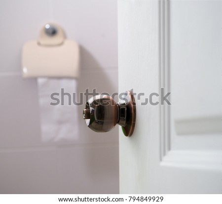 
   Open the door. white toiletroom   