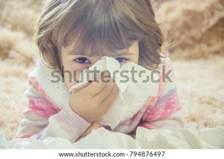 Runny nose. Selective focus.  Royalty-Free Stock Photo #794876497