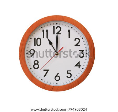 clock of pattern brown wood in eleven o'clock isolated on white background and have clipping paths .