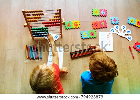 kids learning numbers, mental arithmetic, abacus calculation Royalty-Free Stock Photo #794923879