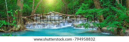 Panoramic beautiful deep forest waterfall in Thailand Royalty-Free Stock Photo #794958832