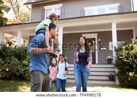 Father Gives Son Ride On Shoulders As Family Leave House Royalty-Free Stock Photo #794988178