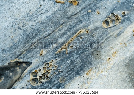 Close up of cement used to make the foundation of the building. There are bubbles of the air Photo taken with natural light Select focus position