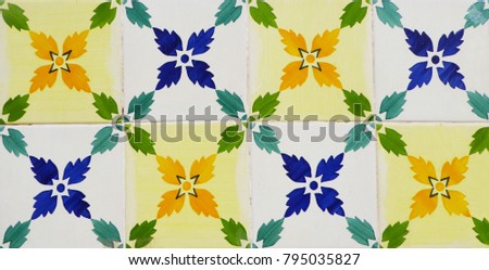 Detail of the traditional tiles from facade of old house. Decorative tiles.Valencian traditional tiles. Floral ornament