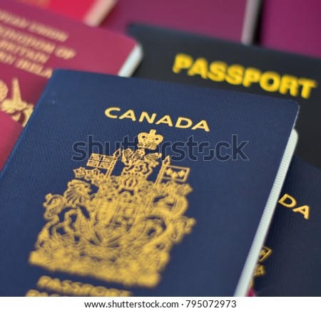 Passport canada on passports background. soft focus