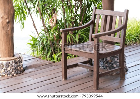 Wood chair in the restaurant on nature background with copy space.