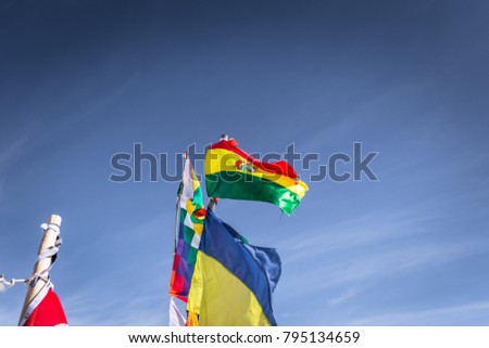 Flags landmark at the Uyuni Salt Flats, Bolivia