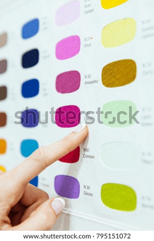 young woman pointing the artistic color for her next design