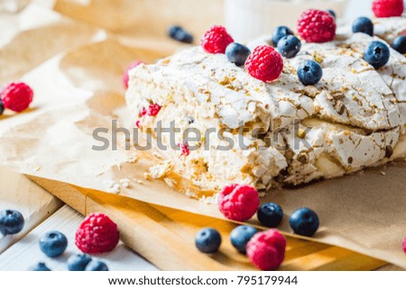 Meringue Almond Roll with Berries, Cream and Lemon Curd
