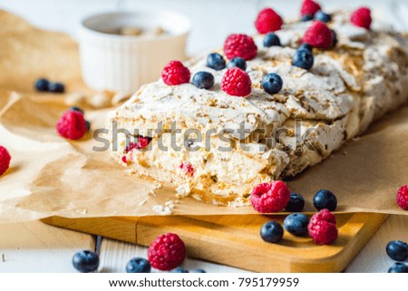 Meringue Almond Roll with Berries, Cream and Lemon Curd