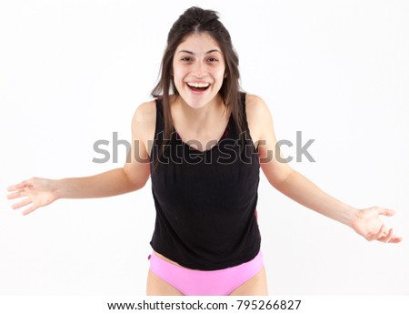 Surprise happy emotional girl on a light background