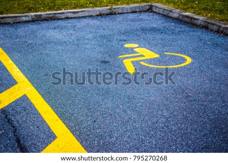 Disabled parking place before the store