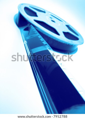 reel of  film of 16 mm on  blue background, close up