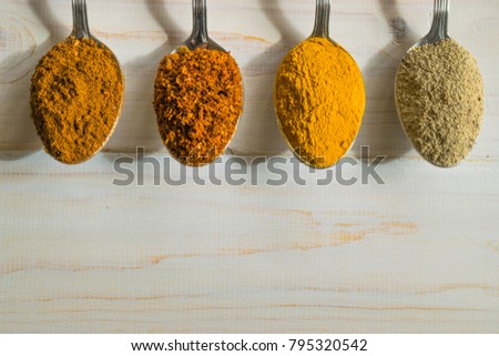 Spoons with spices