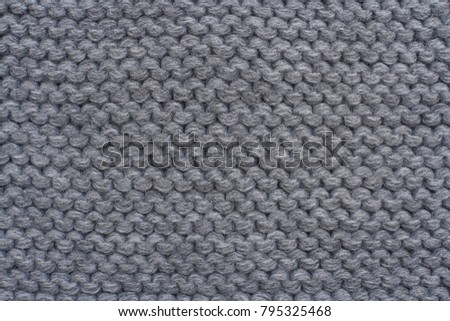 gray knitting with different stitches