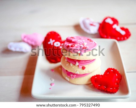 Selective focus image of valentines cookie  on white table background,abstract background to valentine concept.