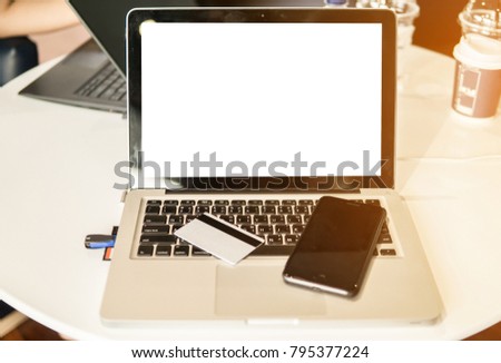 Your working is easier than the past because you can use only computer or smartphone to communicate your business or financial, with blurry background.