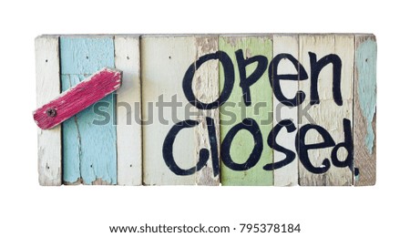 Open and close icons on a wooden isolated on white background. wooden sign on white.