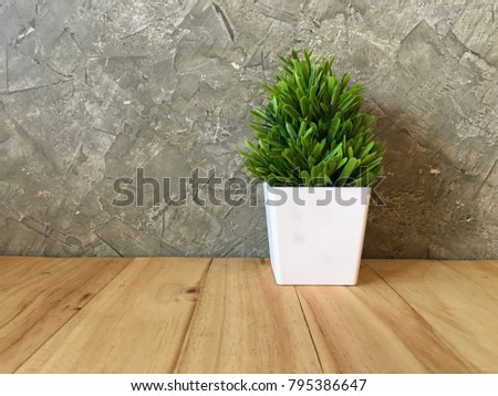 tree Wood table top and blurred flowers background with vintage filter Royalty-Free Stock Photo #795386647